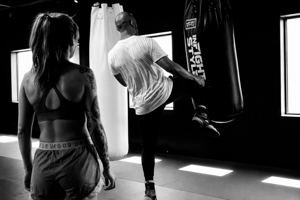 Beginner students learning Muay Thai fundamentals during their first class at Hitters Fight Club Toronto.